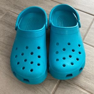 Crocs teal color size 8 mens or 11 womens